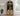 Magnolia Arched Glass Door Cabinet - Weathered Sand/Black